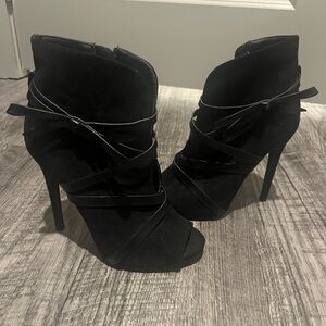 Black leather strap bow heels